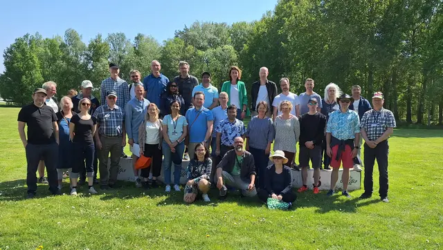 Group photo of the researchers at the SMHI meteorological research unit a sunny day. 